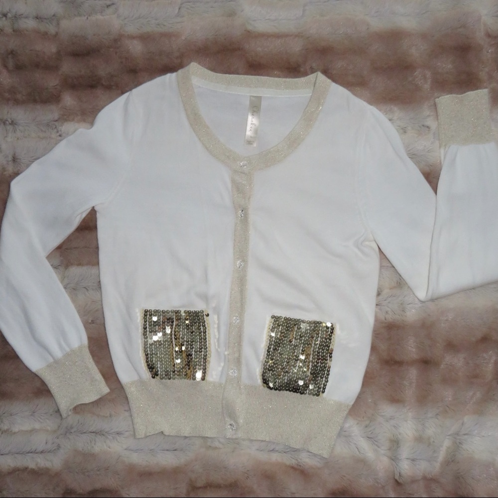 Cherokee Girls sweater with gold sequin pockets